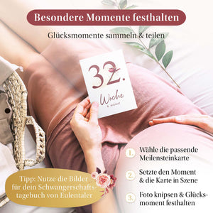 Schwangere Frau hält Meilensteinkarte der 32. Woche - Erinnerungen festhalten und mit dem Schwangerschaftstagebuch von Eulentaler dokumentieren.