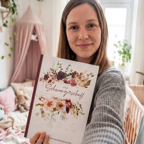 Eulentaler Schwangerschaftstagebuch „Meine Schwangerschaft“ mit floralem Hardcover, Goldprägung und Platz für persönliche Erinnerungen während der Schwangerschaft.

