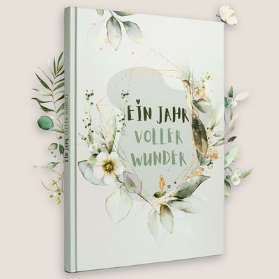 Erinnerungsalbum: 'Ein Jahr voller Wunder' - liebevoll gestaltetes Babytagebuch für besondere Momente und Meilensteine.