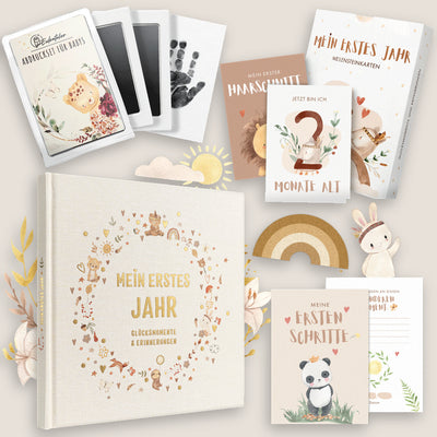 Eulentaler Sparset „Mein erstes Jahr“ mit Babyalbum aus Leinen und Goldprägung, Meilensteinkarten sowie Abdruckset für Hand- und Fußabdrücke.
